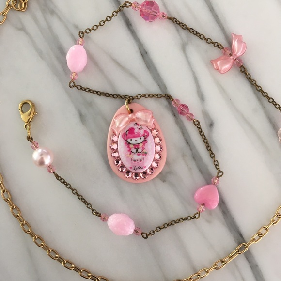 Tarina Tarantino Jewelry - Hello Kitty Pink Head - Lolita Necklace Tarina Tarantino Jewelry - Hello Kitty Pink Head - Lolita Necklace